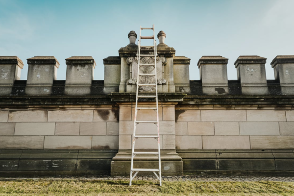 Ladder Over a Parapet